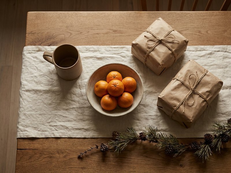 holiday budget planning at the kitchen table — Her Own Compass, financial freedom & travel for women on one income